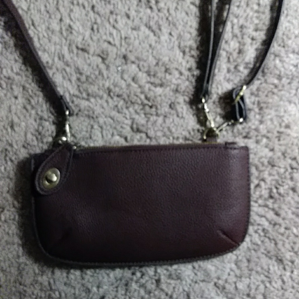 Its a wristlet or a crossbody purse.